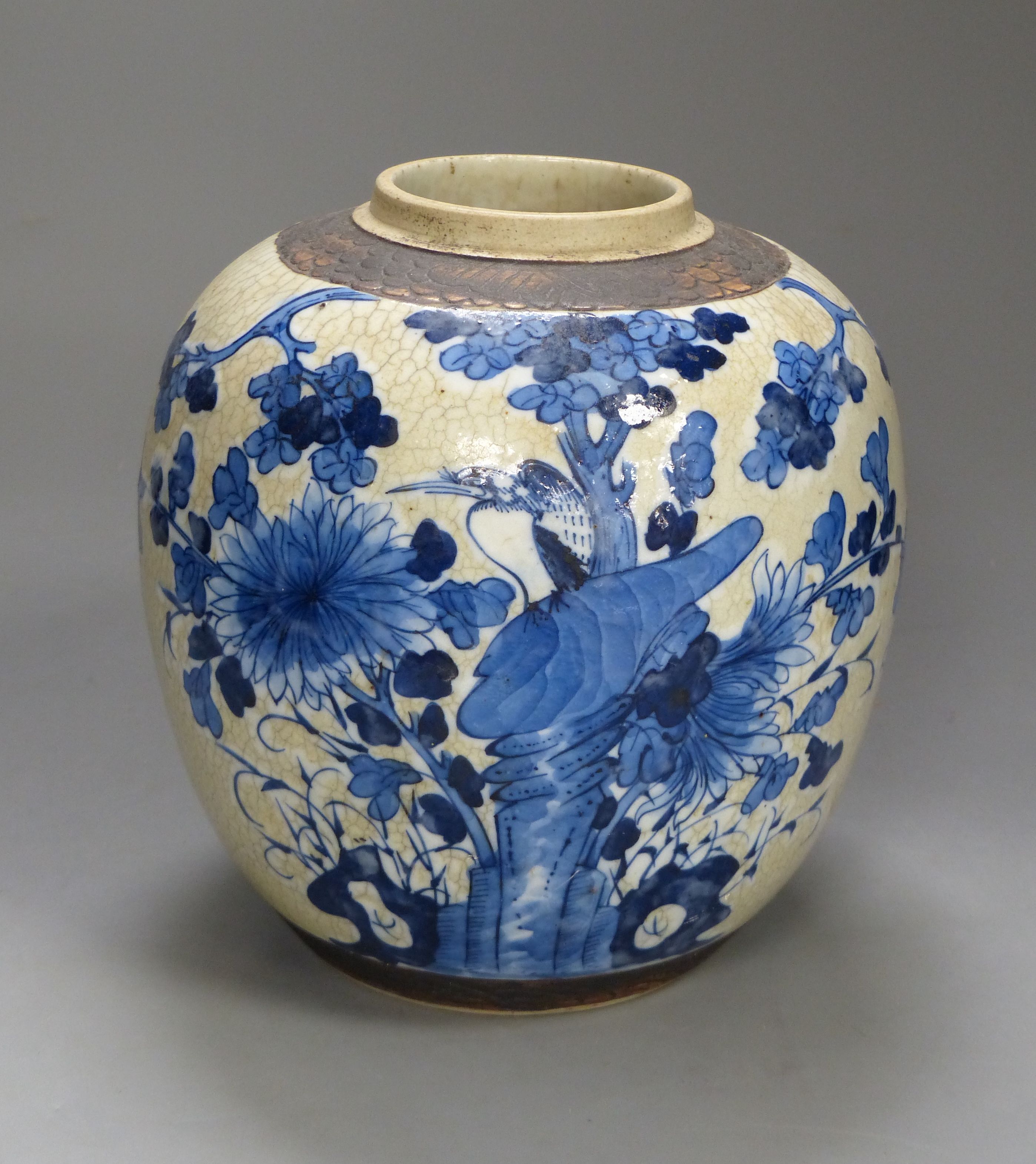 A 19th century/early 20th century Chinese blue and white crackle glaze jar, height 22cm